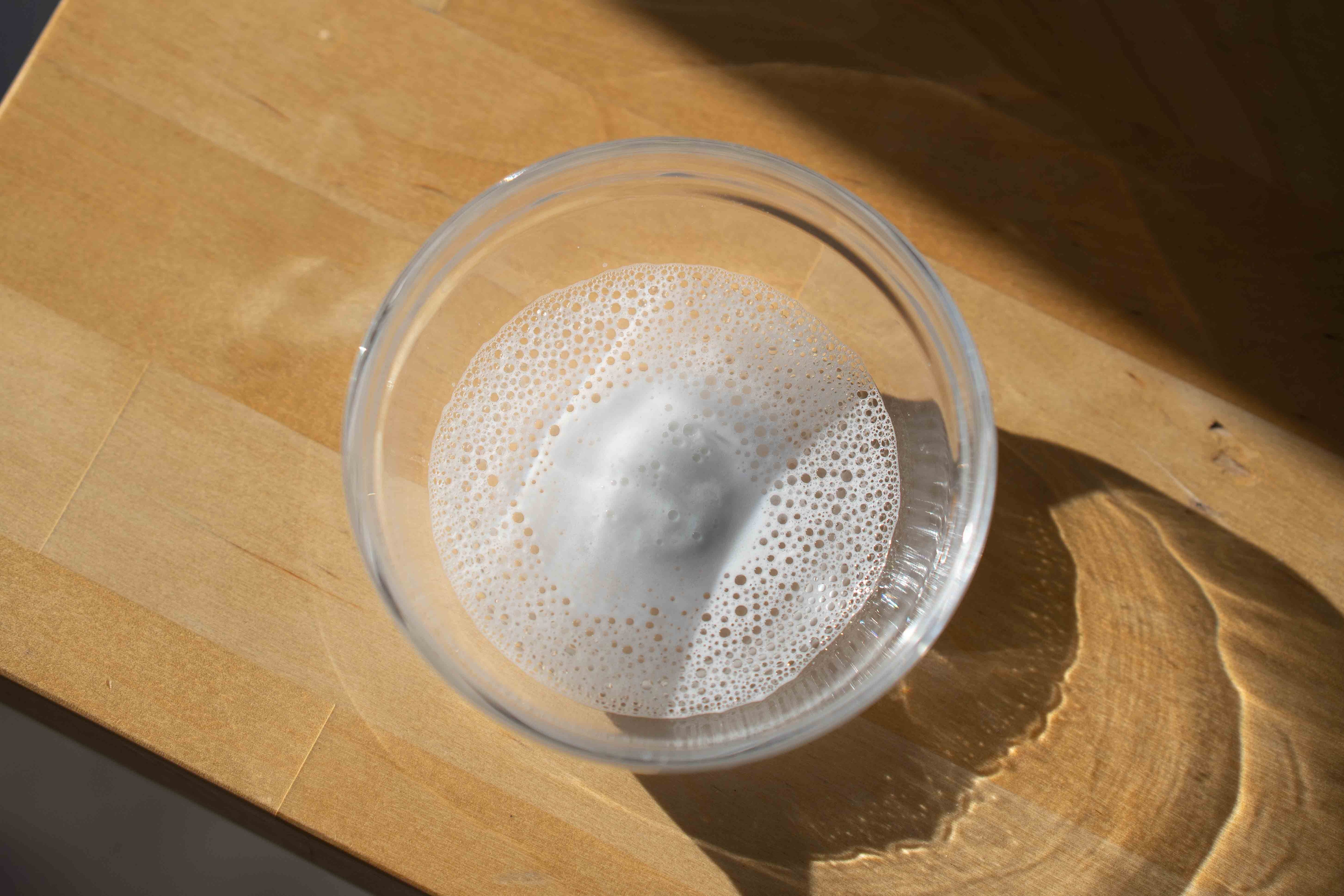 Fizzing Cleaning Bomb dissolving in water, part of a natural cleaning product and bathroom cleaner bomb, safe and effective toilet cleaner bomb for home cleaning.